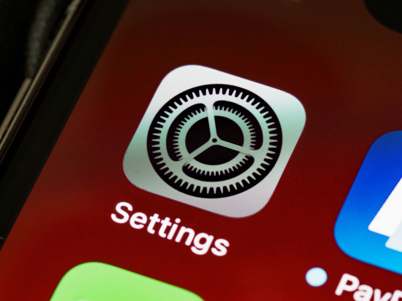 about-us Detailed view of the iPhone screen showing the settings app icon.